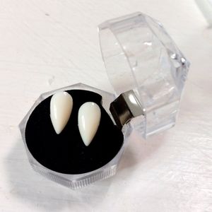 15 mm plastic fangs with adhesive and instructions